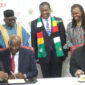 From left(Front): Dr. Bernard Madzima, CEO of NAC assisting Hon. Dr. David Pagwesese Parirenyatwa, SAA/ICASA 2023 President, with H.E. Dr. C. G.D.N. Chiwenga, Vice President and Minister of Health and Childcare/ICASA 2023 Vice President, Zimbabwe, being assisted by Air Commodore (Dr.) Jasper Chimedza, Permanent Secretary for Ministry of Health and Child Care, at the signing of the MoU at State House, Harare, Zimbabwe In the background, From left: Mr. Luc Armand Bodea, ICASA Director, H.E. Emerson Mnangagwa, President of. Zimbabwe, Prof. Morenike Ukpong, SAA Treasurer and Dr. Fikile Ndlovu, SAA Deputy Secretary General, during the Signing of the ICASA 2023 MoU, State House, Harare, Zimbabwe