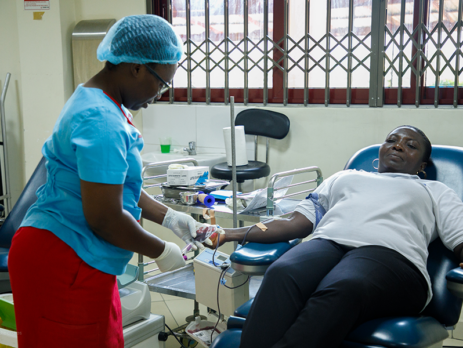 A donor donating blood during Society for AIDS in Africa World AIDS Day Blood Donation Exercise at the National Blood Service Headquarters, Korle Bu, Accra