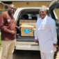 WHO-presents-toolkits-to-Mr. Innocent Laison, ICASA Onsite Manager