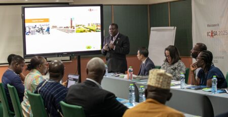 ICASA 2025 Assessment: Dr. Samuel Ayisi Addo, Program Manager, National AIDS Control Programme, presenting the summary of Ghana's Host Country Bid to the development partners, CSOs and the ICASA Assessment Team during day one of the Assessment Team's visit to Ghana, Alisa Hotel North Ridge, Accra - Ghana
