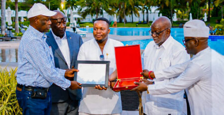 From left, Dr. Richard Nchabi Kamwi (New SAA President), Hon. Dr. David Pagewese Parirenyatwa (Outgoing SAA President), Prof. Robert Soudre (Past SAA President) and Mr. Luc Bodea (SAA/ICASA Director) presenting an award to Mr. Chris Nuatro (Senior Marketing & Partnership Officer).
